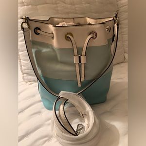 Michael Kors bucket handbag with shoulder strap.